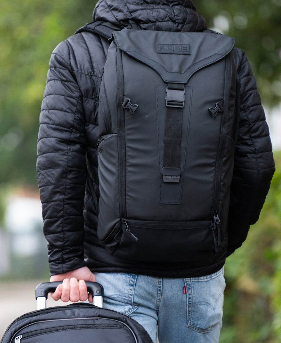 HUUB Travel Backpack – 24L commuter laptop bag, waterproof, helmet net, large clam opening, side handles